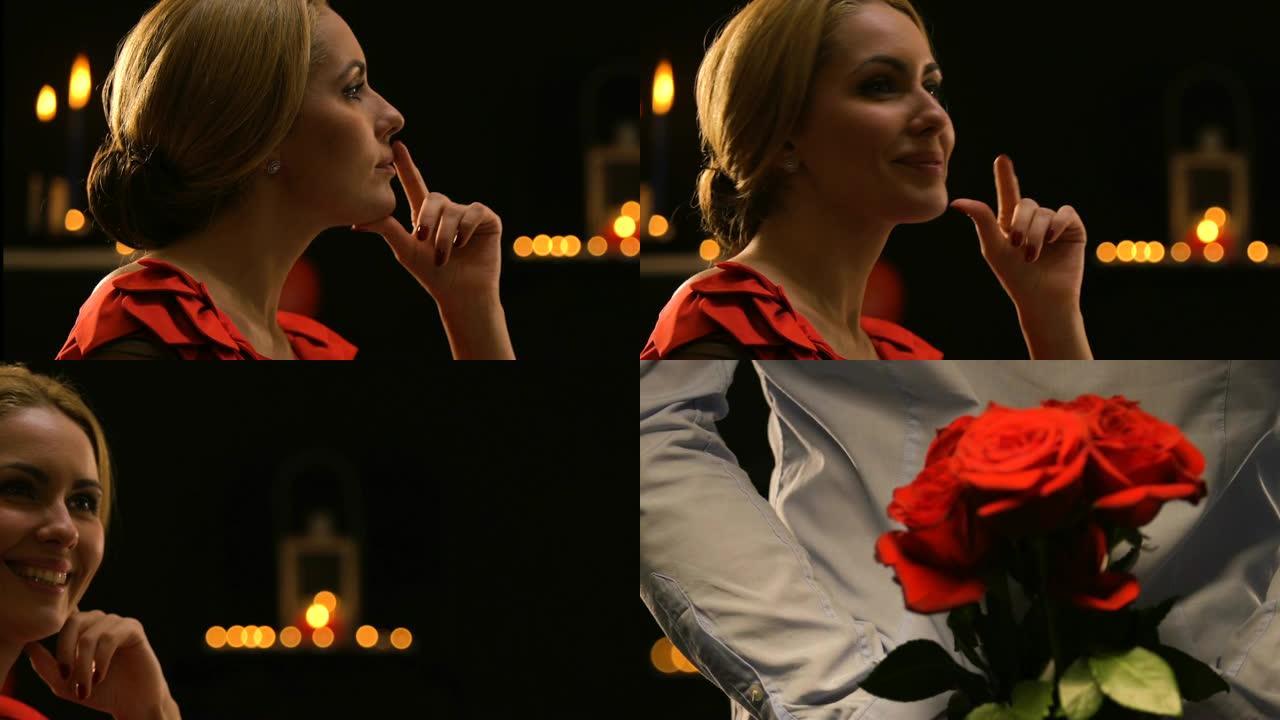 优雅的女士很高兴看到她等待的男朋友，男人拿着玫瑰，惊喜