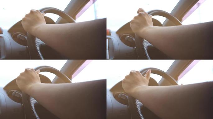 4K: 女性驾驶汽车。