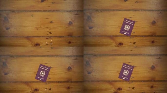 意大利护照被放在木头上的细节照片