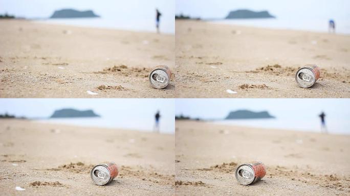 多莉射击: 海滩上的废物回收，饮料罐。