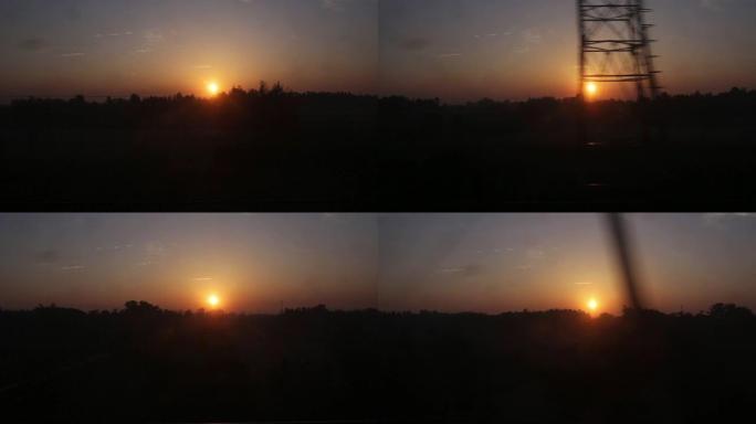 从火车窗口看早晨的日出