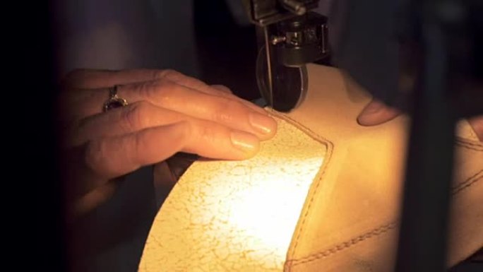 女裁缝熟练的手特写展示手工业手艺活