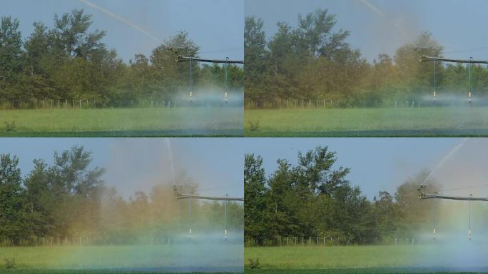 圆形灌溉末端洒水装置在运动中，折射光产生彩虹色