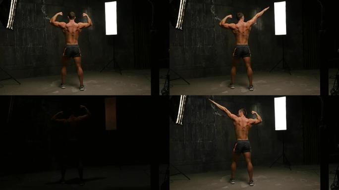 美丽的肌肉男赤裸上身展现运动姿态