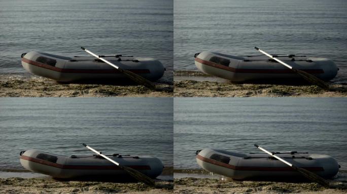 停泊在岸上的充气船，海岸警卫队的概念，及时救助溺水