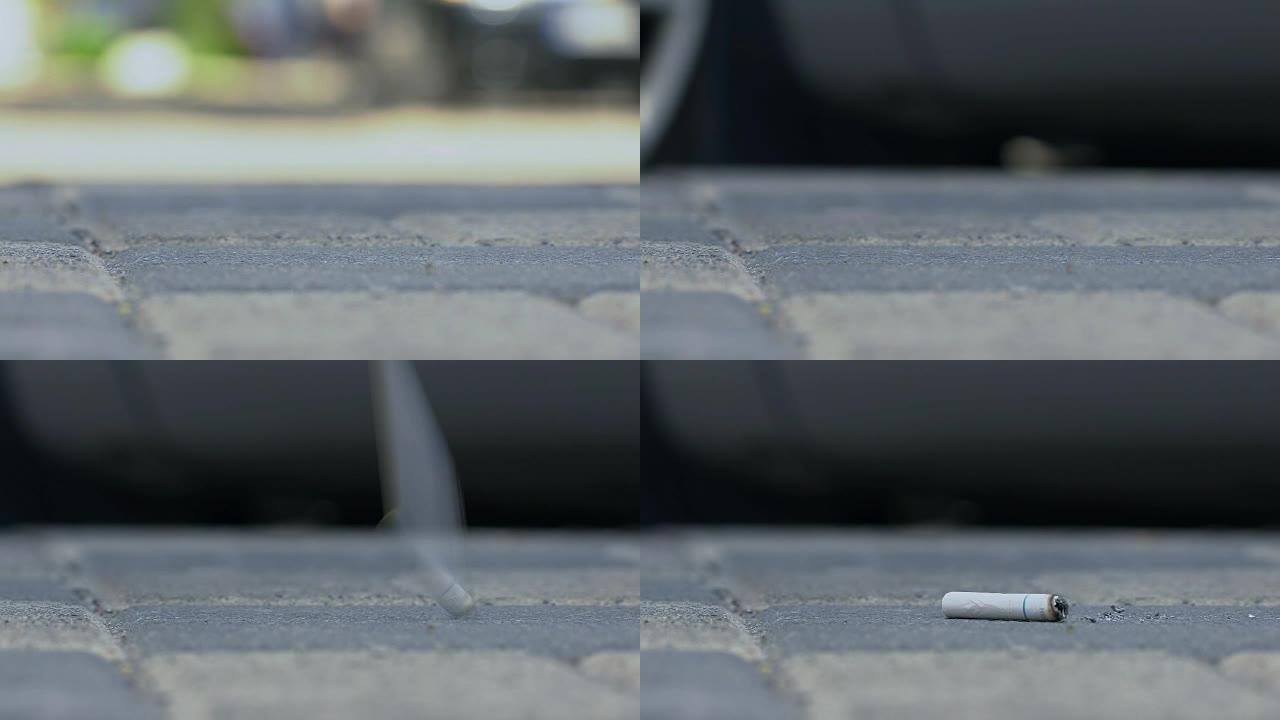 烟头在人行道上扔出汽车，环境污染问题