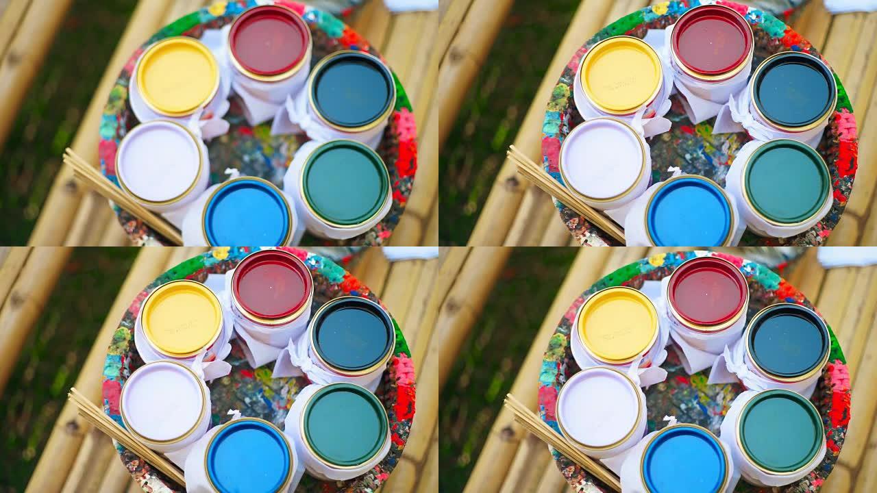 多色油漆桶。彩色油漆特写实拍