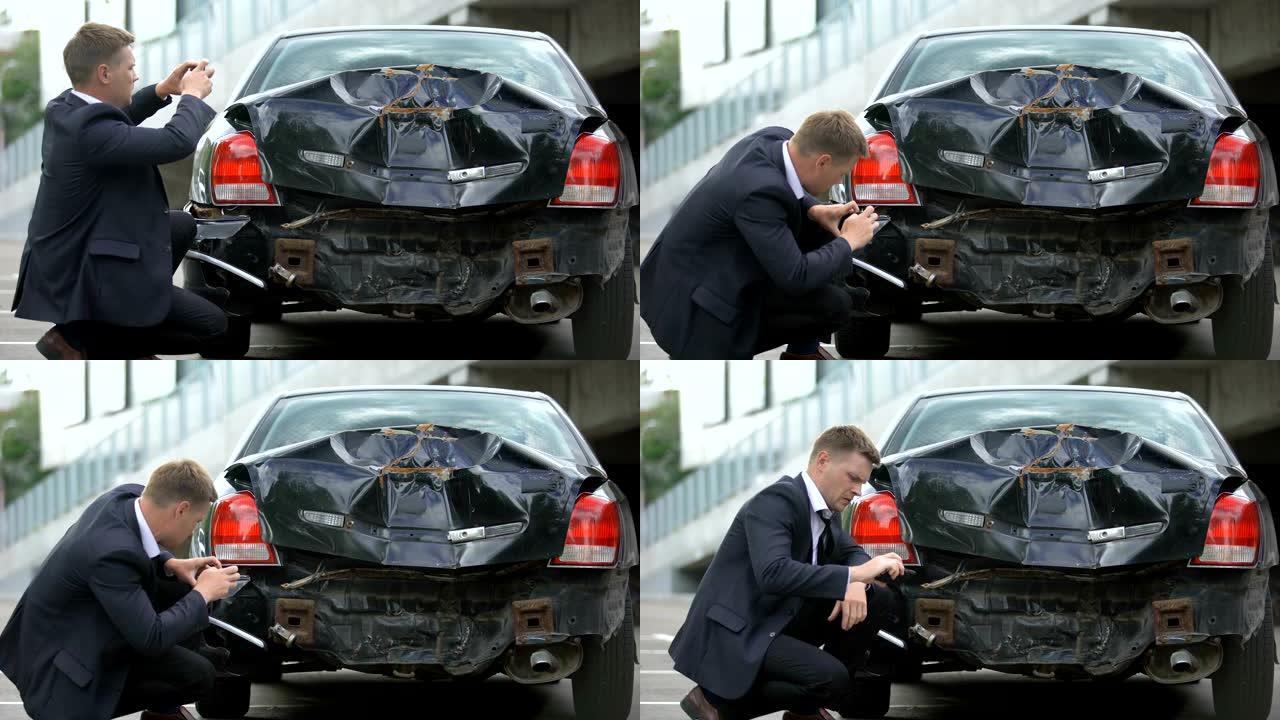 男司机在车祸后拍摄汽车损坏照片，保险赔偿