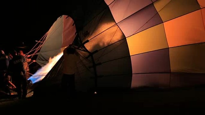 晚上的气球节火焰充气夜晚夜间人类探索