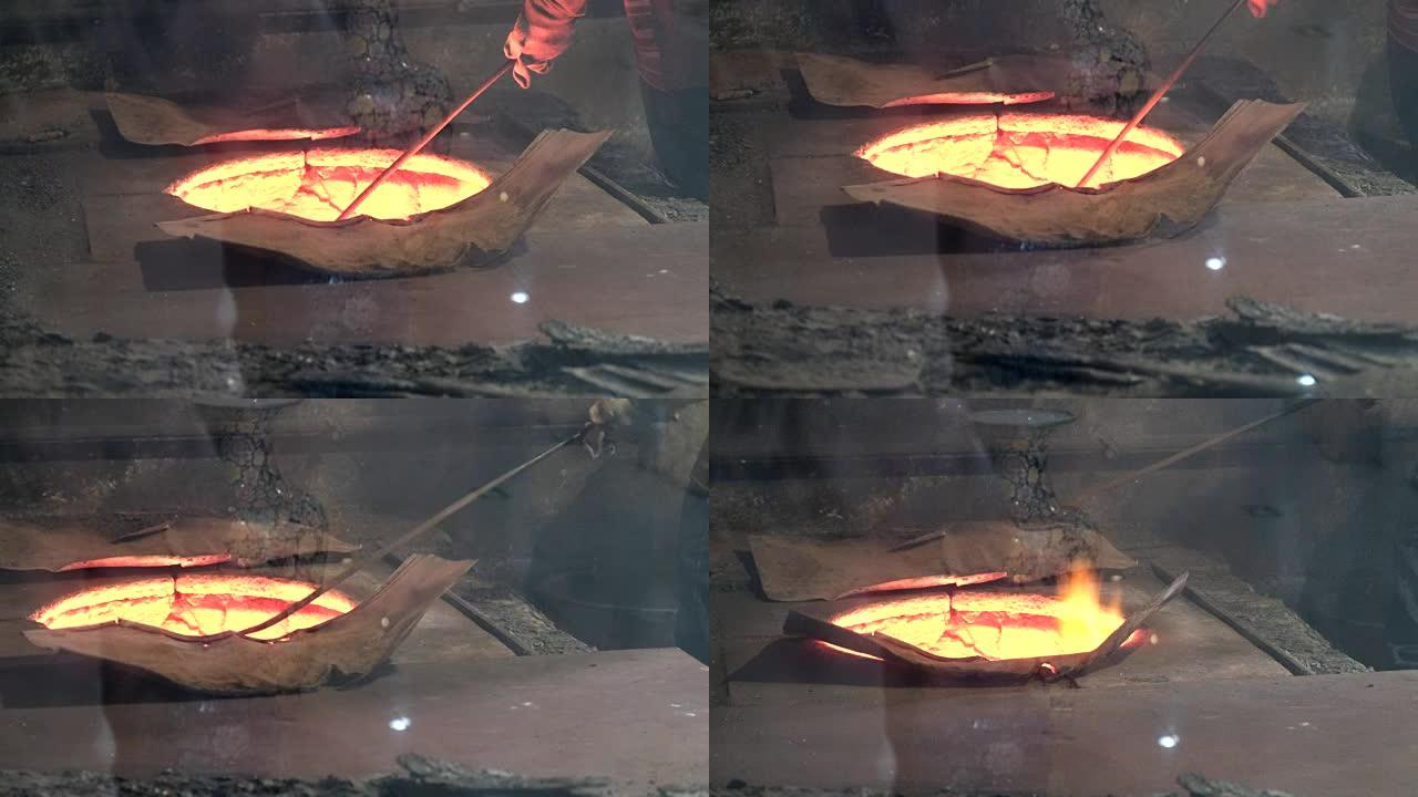 工人烧制陶土，北京，中国。
