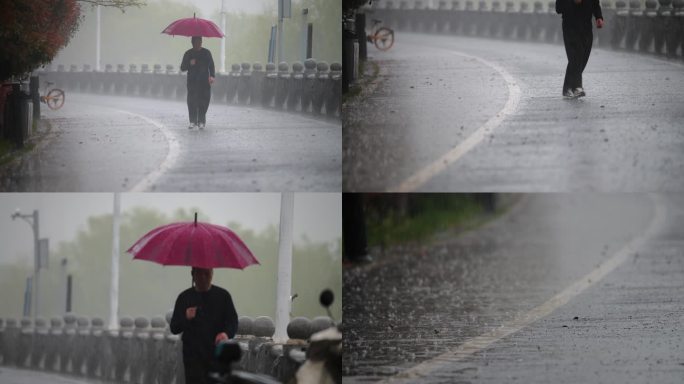 4K狂风暴雨中撑伞艰难行走的路人升格空镜