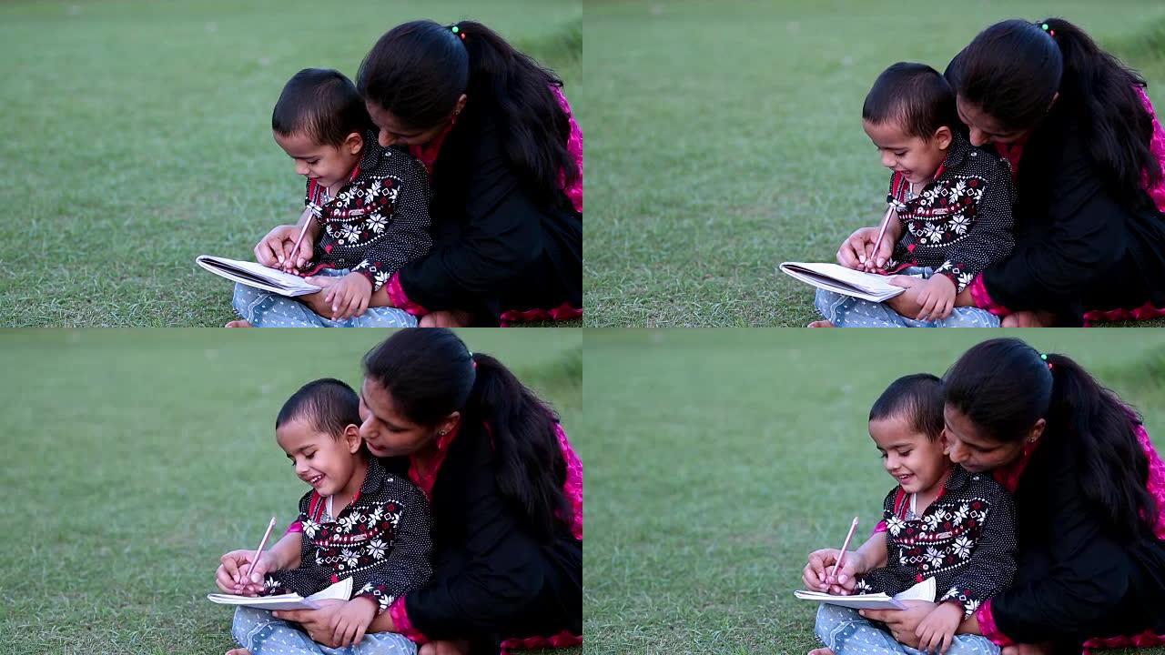 母亲帮助儿子做学校作业