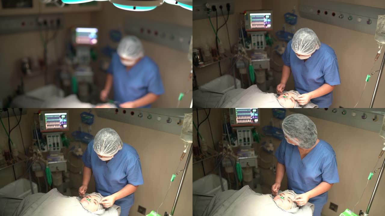 麻醉师/护士在医院手术室为患者准备手术