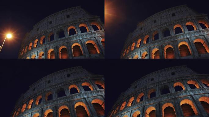 在夏季温暖的夜晚，雄伟的罗马竞技场:在意大利度假