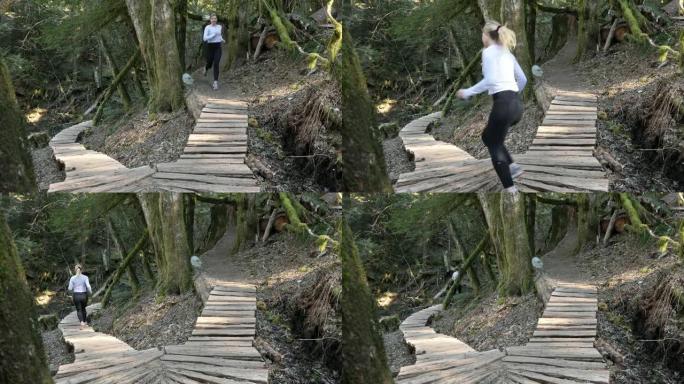 女越野跑运动员沿着高温雨林走