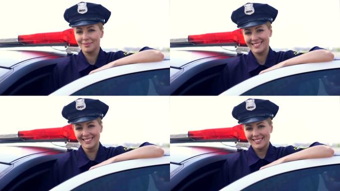 身穿警服的坚强女人站在巡逻车旁微笑，治安