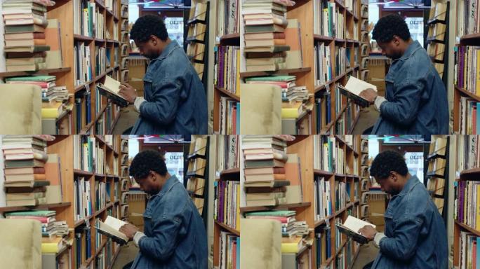 男人在二手书店里选书