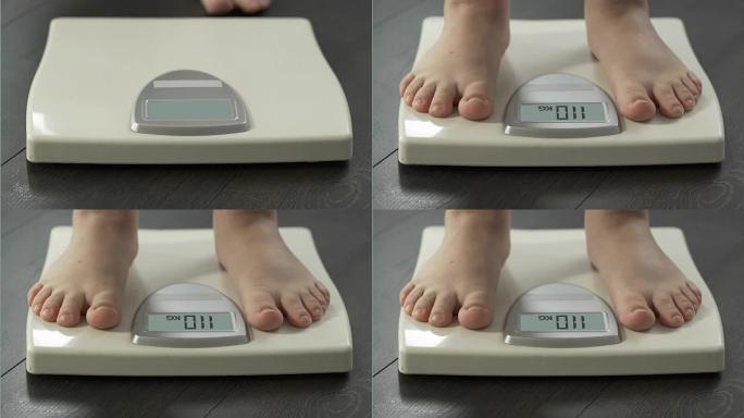 肥胖女性在体重秤上测量体重，超重，正面观察
