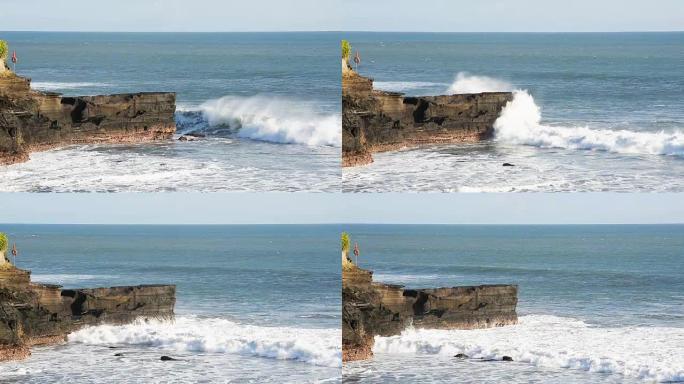 高清: 来自太平洋的海浪在印度尼西亚巴厘岛海滩的悬崖上坠落