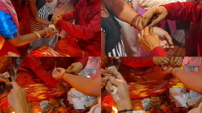 在庙里传道的人在手腕上系一根红线，这是受监护的