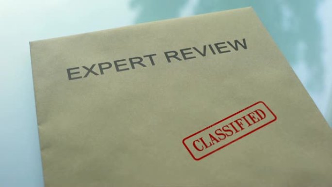 专家评审分类，用重要文件在文件夹上手工盖章