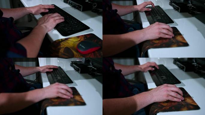 使用计算机键盘和鼠标打字近距离跟踪男性手的慢动作镜头