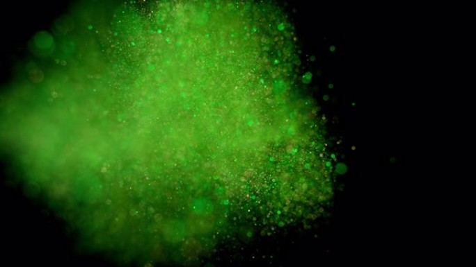 黑色背景下绿色闪光的SLO MO LD爆炸