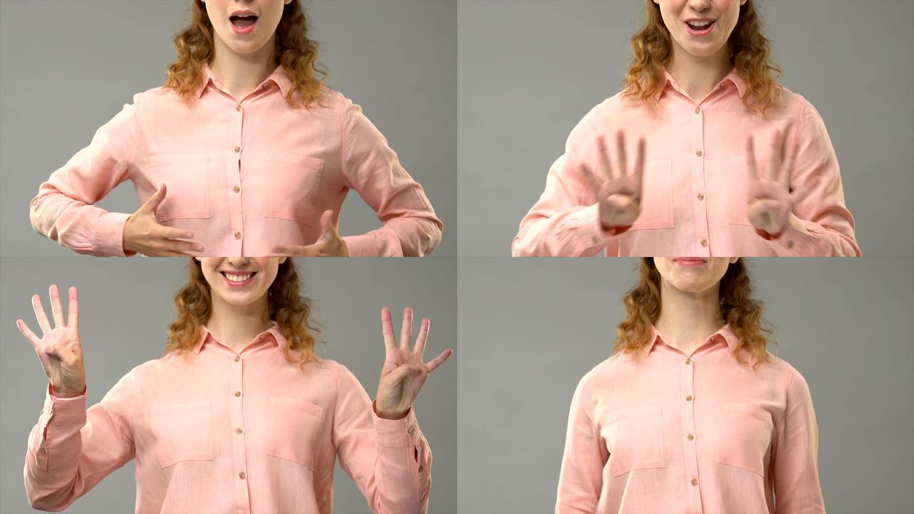 聋哑妇女用手语说光明节快乐，用asl显示单词，课程