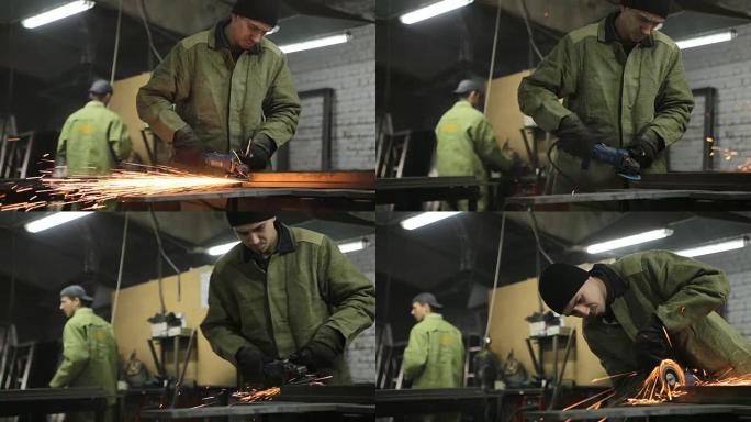 工人在金属工件上打磨焊缝。