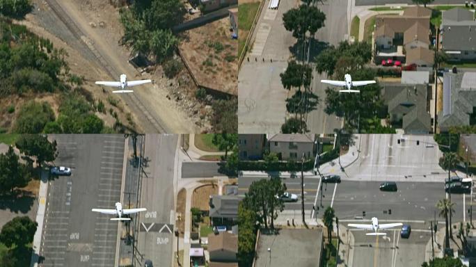 空中小型飞机飞越加利福尼亚的一个城镇