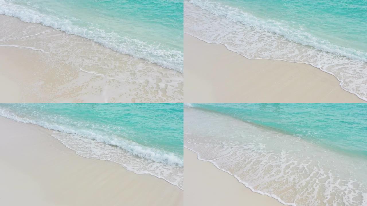 波浪卷起白色沙滩海边大海海水