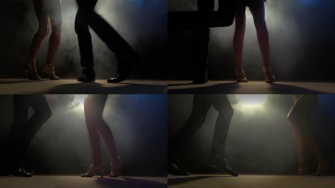 舞者的脚恰恰舞踢踏舞低角度低视角夜晚逆光