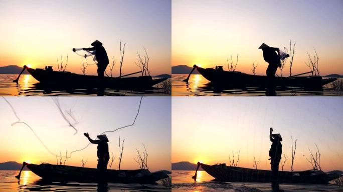 高清慢动作: 泰国日落时分在长尾船上钓鱼的渔民