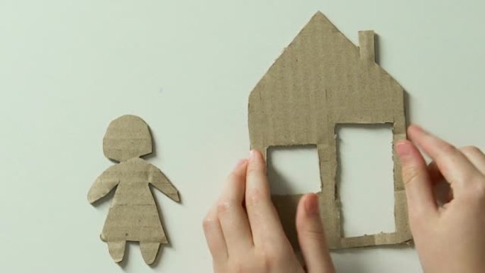 手工为纸孩子添加房屋形象和玩具心，梦见家