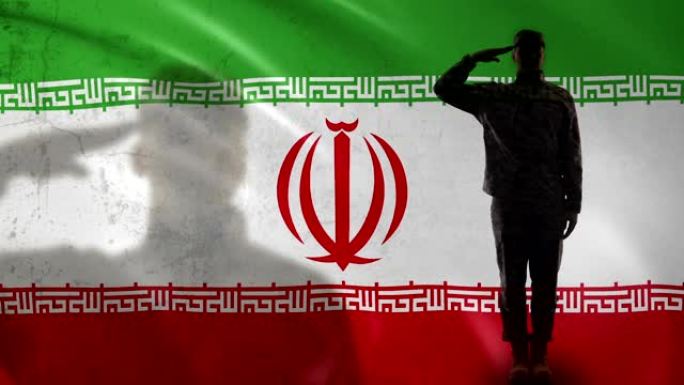 伊朗士兵剪影向国旗致敬，退伍军人