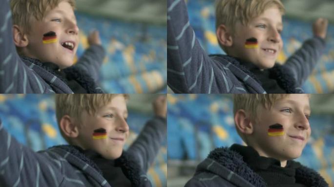 德国球迷大喊大叫，在体育场观看足球冠军，开心