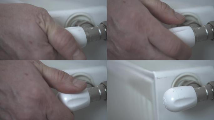 男性高加索人手转动水龙头的极端特写。无法识别的成年男子在浴室里打开水。生活方式，卫生，洗手。