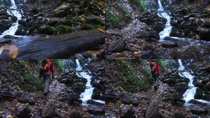 秋天，男人带着树叶经过河