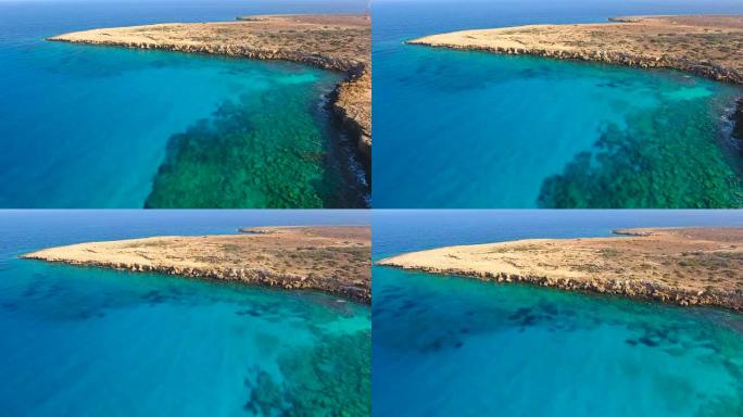 塞浦路斯，阿依纳帕，希腊角。鸟瞰图。美丽的风景和海浪。蓝色泻湖。