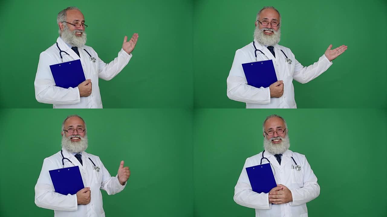 成人高级医生展示复印空间，并在绿色背景上微笑