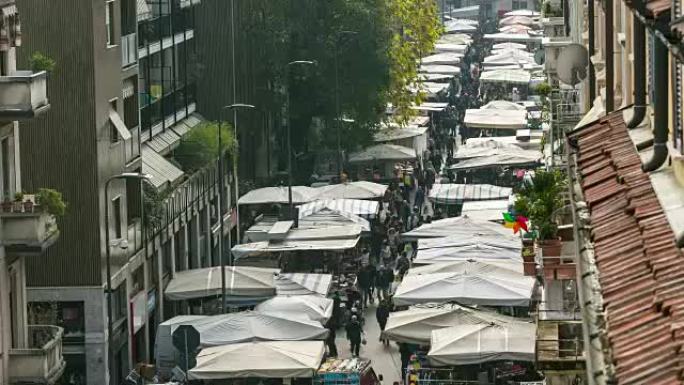 延时: 欧洲米兰的周日市场步行街。
