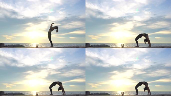 亚洲女性在夏季海边练习瑜伽。