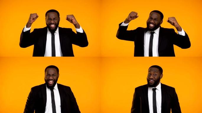快乐情绪激动的非洲裔美国经理微笑并做出yes手势，获胜者
