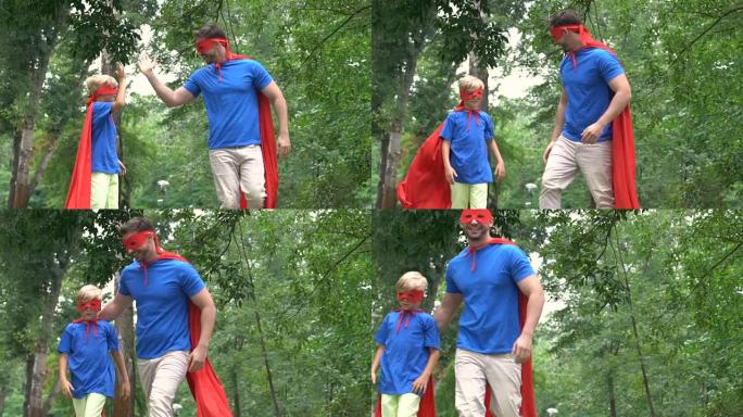 父亲和儿子穿着超级英雄服装击掌，团队合作理念，目标实现