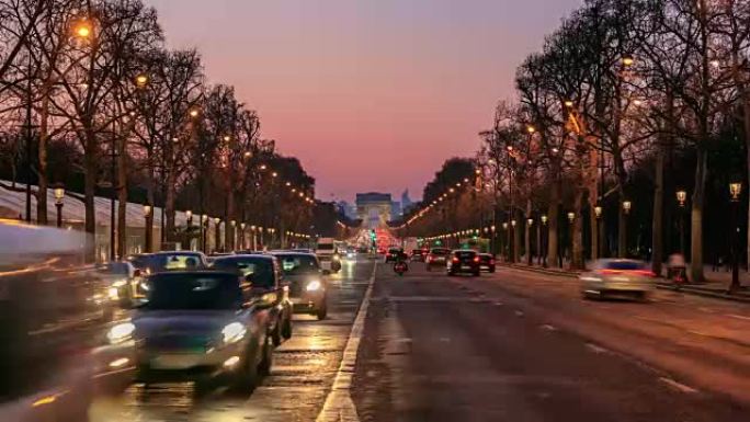 法国巴黎，凯旋拱门和香榭丽舍大街日落时分，延时