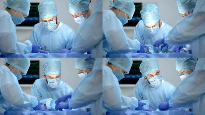 神经外科医生使用现代设备在医院进行手术，工作