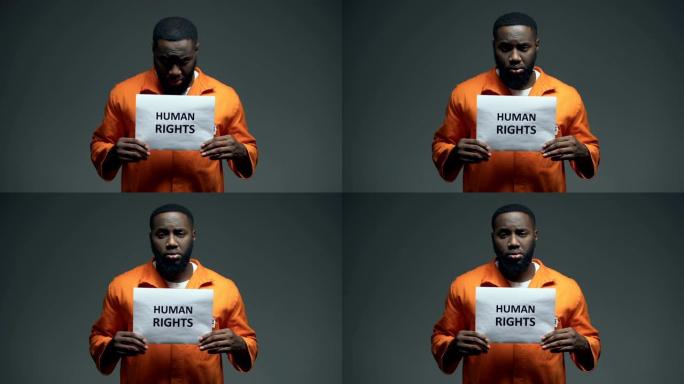 拿着人权标志的非裔美国囚犯，虐待，意识