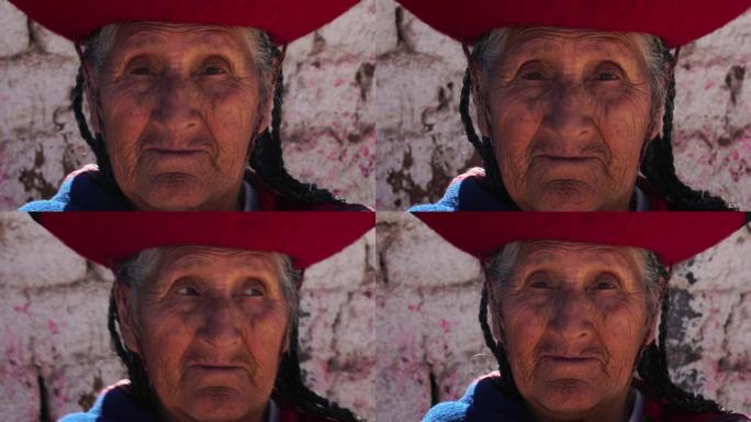 秘鲁Chinchero戴着传统帽子的老年妇女