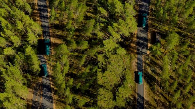 芬兰森林的鸟瞰图。汽车在路上行驶，顶视图。芬兰美丽的自然。