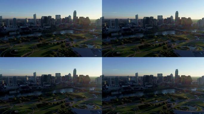 奥斯汀得克萨斯日出从远处俯瞰整个公园区域在南部的第一天，通过首都周围的西南鸟瞰图